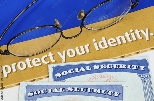 Identity theft image of social security cards and the words protect your identity